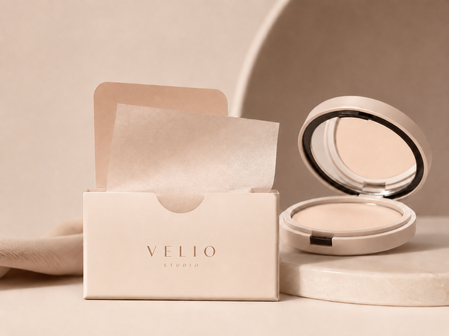 Unbranded VELIO-style blotting paper visual with oil-control sheets and compact.
